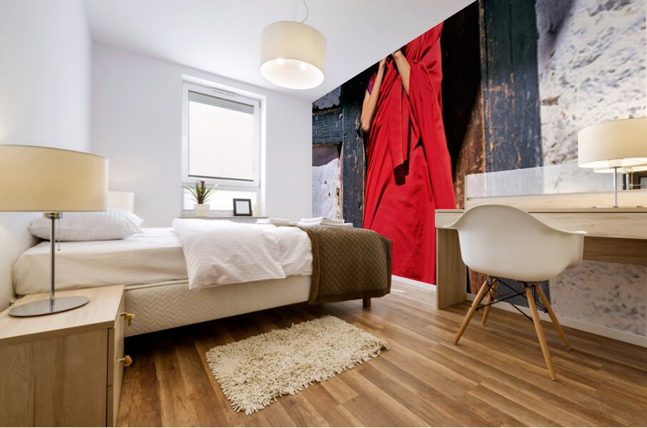 Monk in red robes on cell phone. Mural print