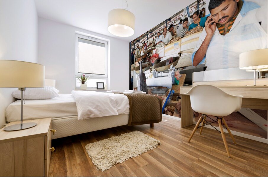 Man talks on phone at busy fish market in Dubai UAE Mural print