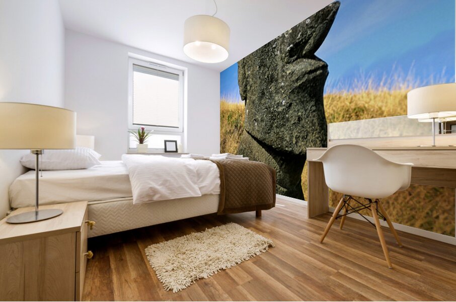 Iconic Moai statue stands tall on Easter Island. Mural print