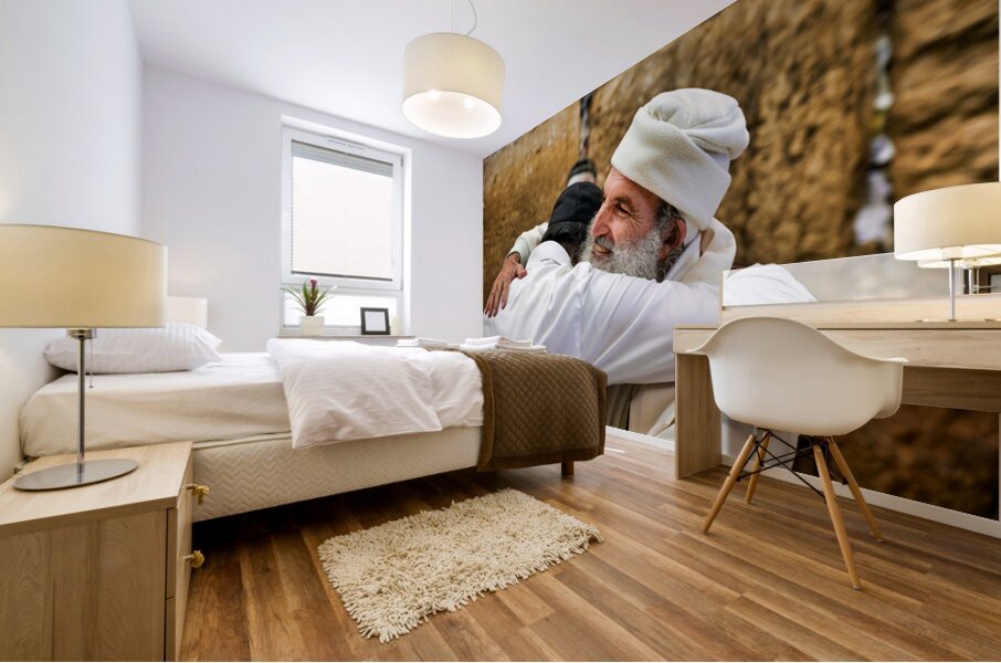 Men embrace each other at the Wailing Wall in Jerusalem Mural print