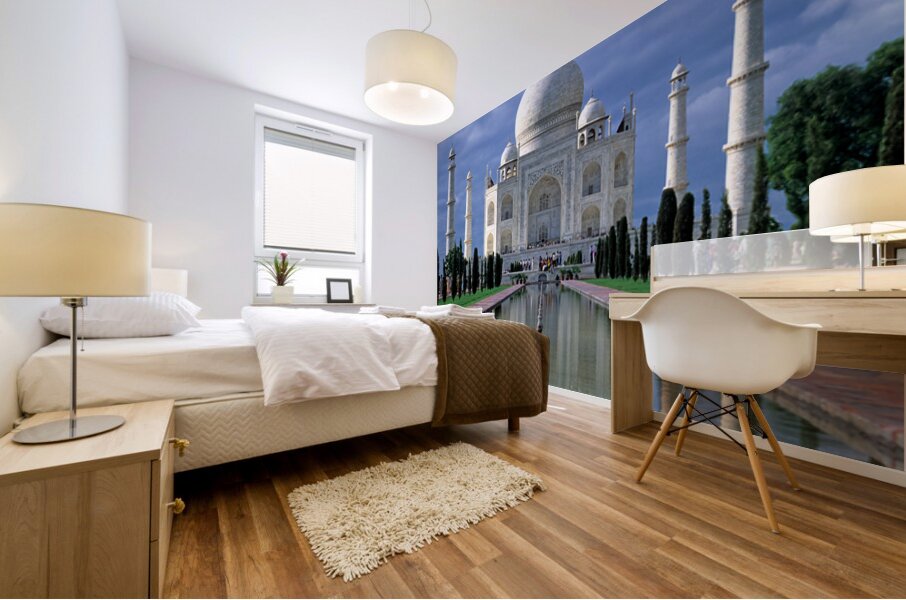 Taj Mahal stands in Agra with clear sky and reflecting pool Mural print