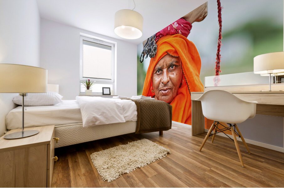 Portrait of an old woman in Rajasthan India wearing bright clot Mural print