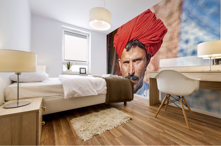 Man in red turban poses in Rajasthans Jaisalmer market street Mural print