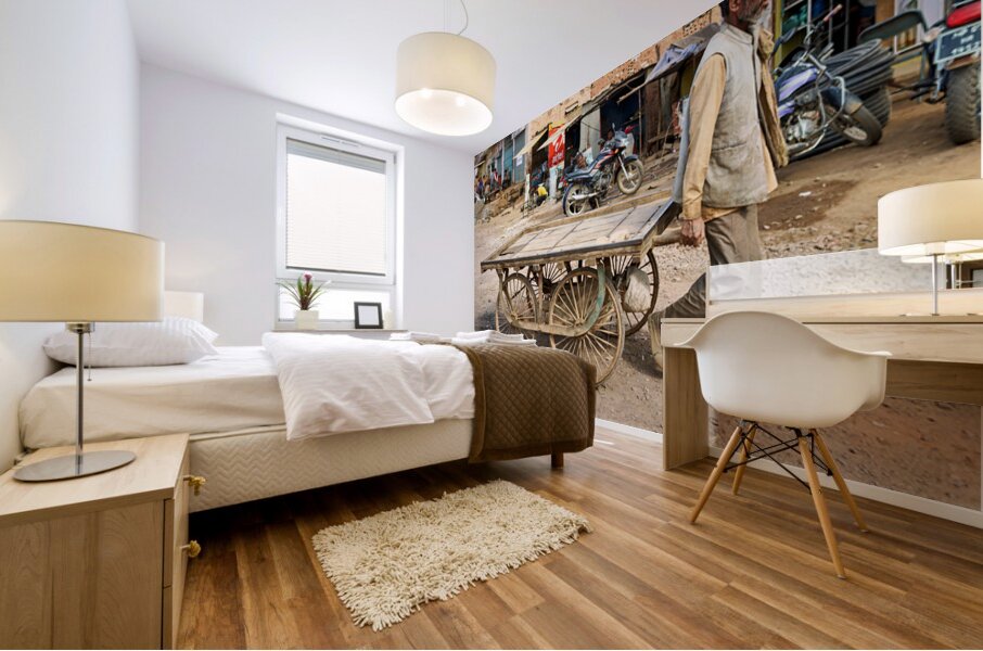 Man pulls an empty cart in Orchha Madhya Pradesh India Mural print