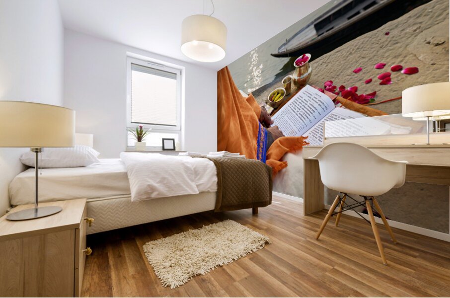 Praying by the ganges river in varanasi india Mural print