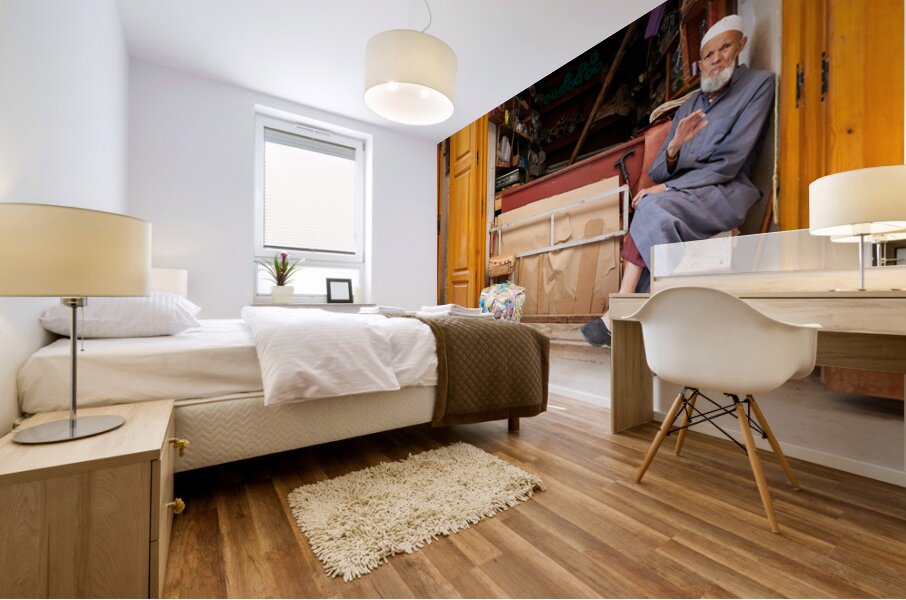 Old man in second hand shop at medina in Fez Morocco Mural print