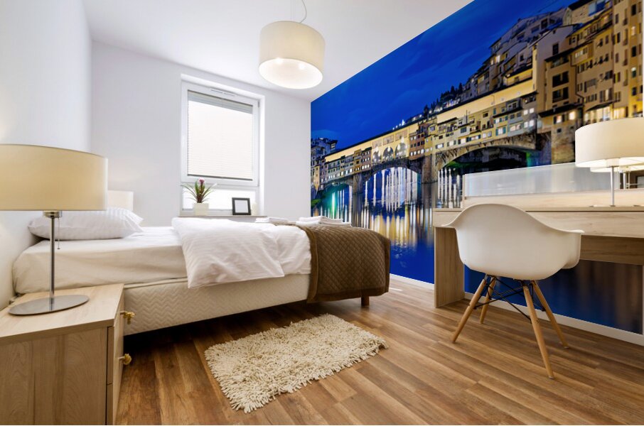 Ponte Vecchio bridge in Florence under evening sky over river Ar Mural print