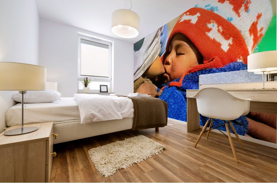 Indigenous mother nourishes child in the Andes of Argentina Mural print