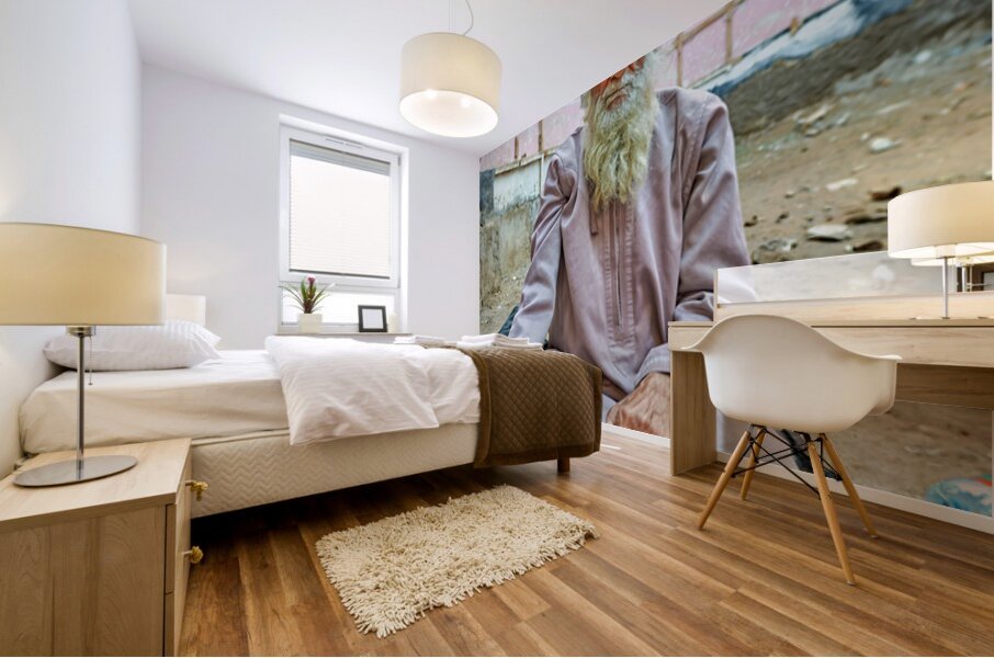 Old man sitting in a historical site in Muscat Oman Mural print