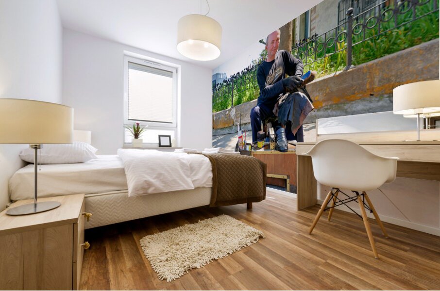 Shoeblack working on shoes in Istanbul Turkey during the day Mural print