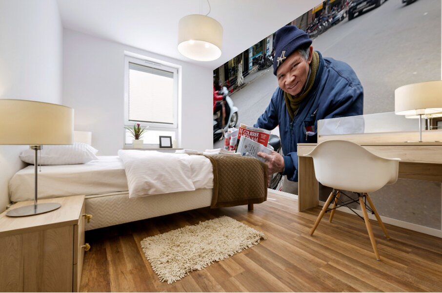 Man selling newspapers in Ho Chi Minh City Mural print