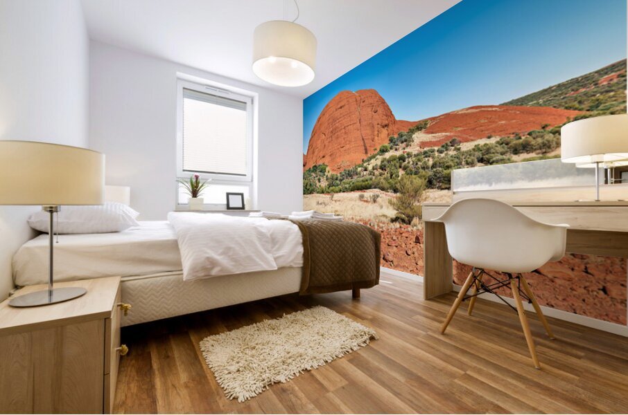 Vast red rock formation under a clear blue sky. Mural print