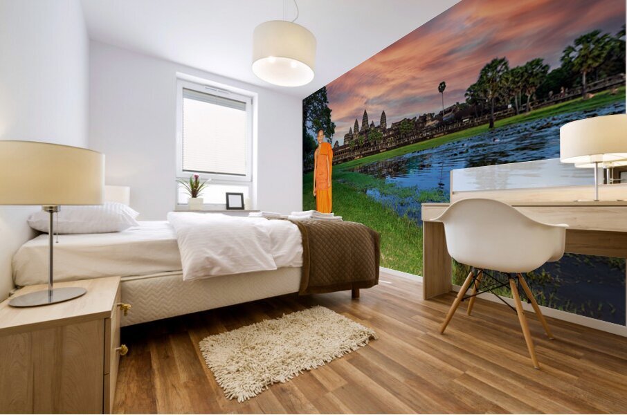 Monk stands by pond with Angkor Wat and sunset sky. Mural print