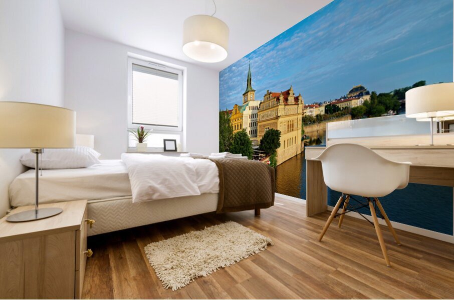 Pragues Vltava riverfront with historic architecture and lively Mural print