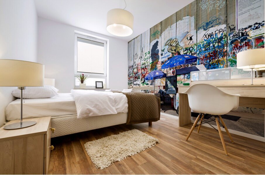 Separation wall in Bethlehem with a juice stand near graffiti Mural print