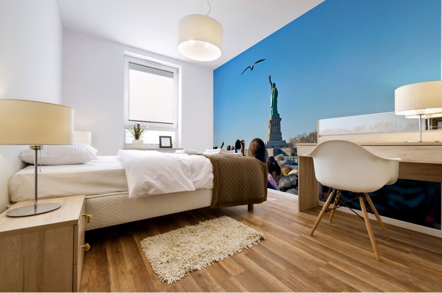 Tourists travel to Liberty Island by ferry in Manhattan New Yor Mural print