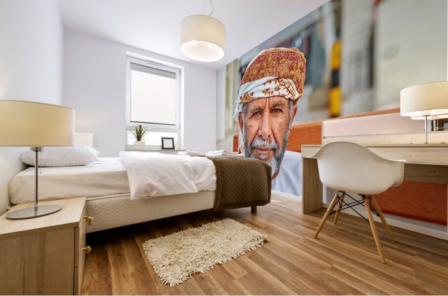 Man sitting on a bench in Muscat Oman during the day Mural print