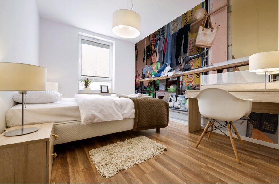 Sewing clothes at a market stall in Phu Quoc Vietnam Mural print