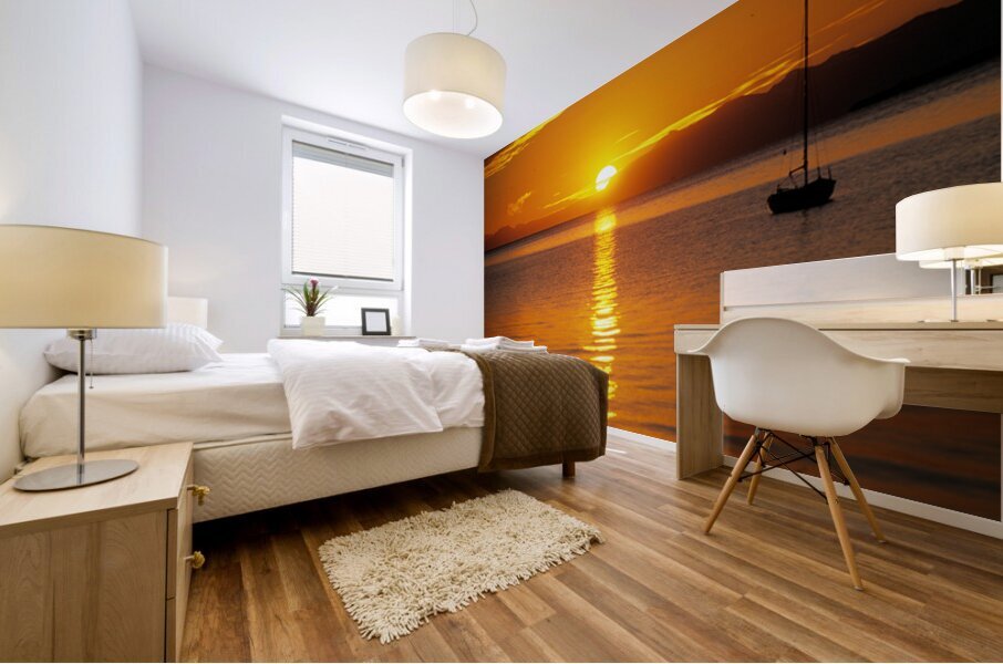 Midnight sun at Longyearbyen in Svalbard with a boat on the water Mural print