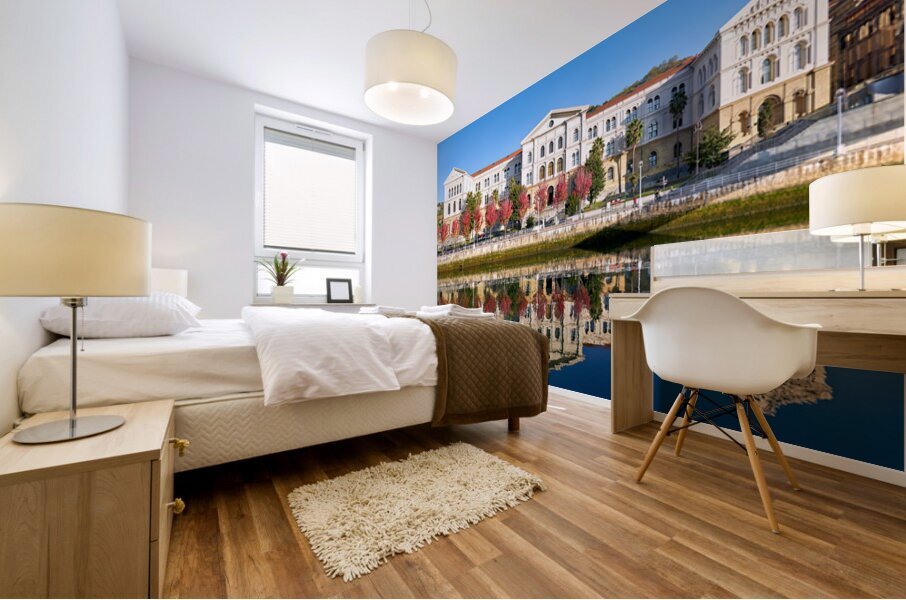 University building reflects in water in Bilbao Spain Mural print