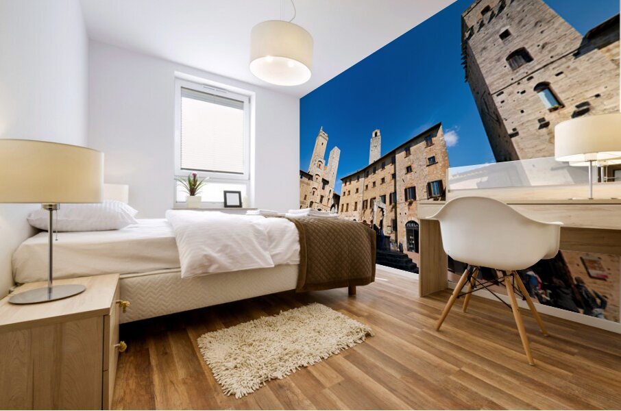 Visitors walk through Piazza della Cisterna in San Gimignano Mural print