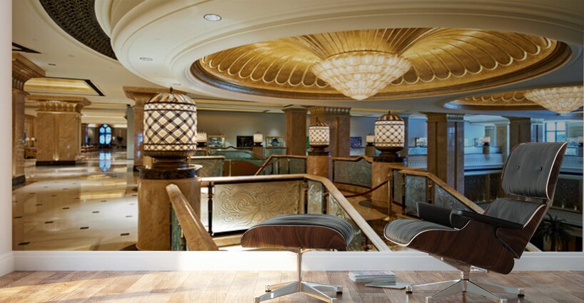 Opulent hotel lobby with grand staircase and golden chandeliers. Wall Murals