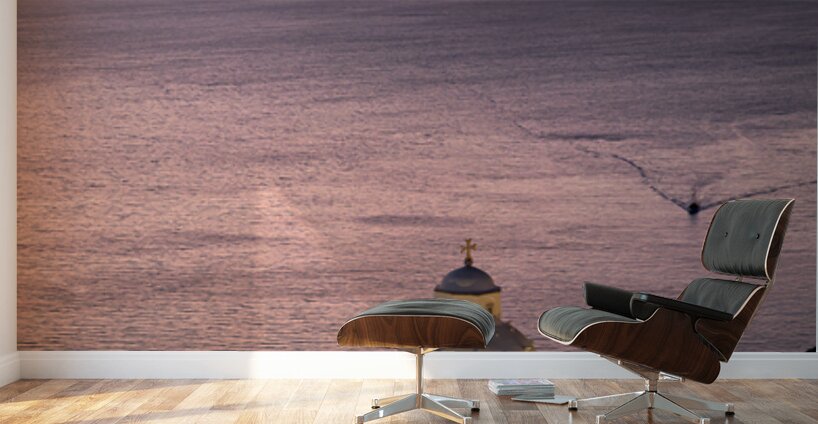 Sunset over Santorini caldera with church and boats. Wall Murals
