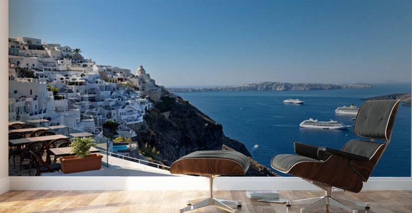 Santorinis white village blue caldera and cruise ships. Wall Murals