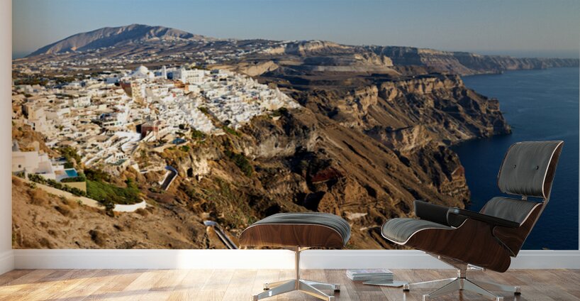 Santorinis white buildings on caldera cliffs above the sea. Wall Murals