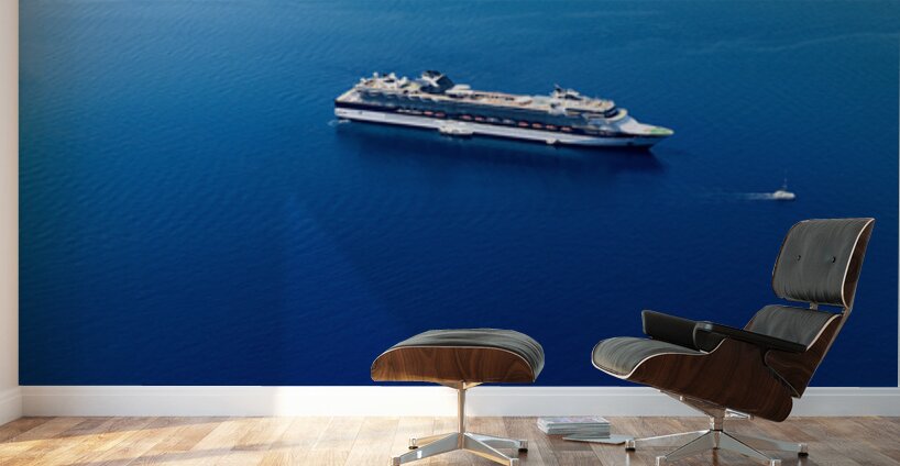 Cruise ship in deep blue sea volcanic islands rocky foreground Wall Murals