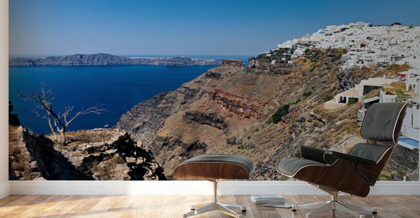 Picturesque Santorini: white village blue sea volcanic cliffs. Wall Murals