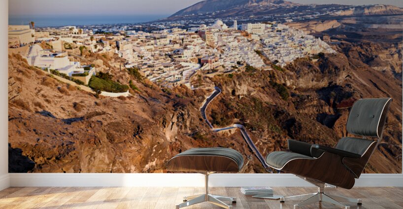 Santorinis Fira town on caldera cliff at sunset. Wall Murals