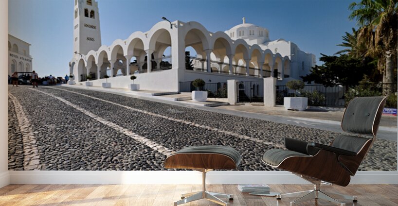 Beautiful white church and cobblestone street in sunny Santorini Wall Murals