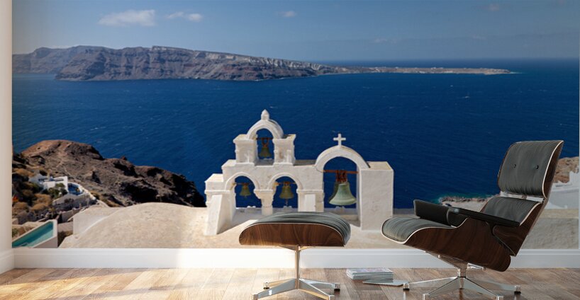 Iconic Santorini bell tower overlooking the caldera and Aegean S Wall Murals