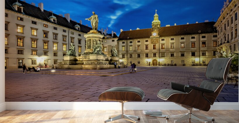 Hofburg Palace square at night with illuminated buildings and st Wall Murals