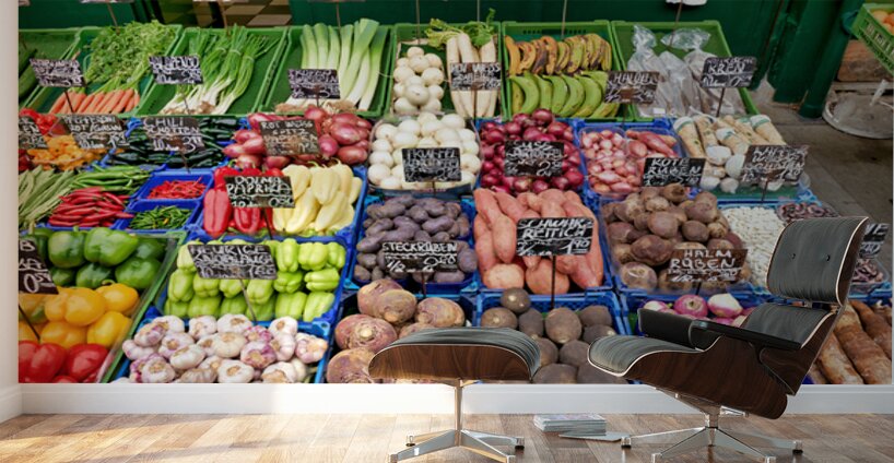 Colorful fresh vegetables and fruits displayed at a market stall Wall Murals