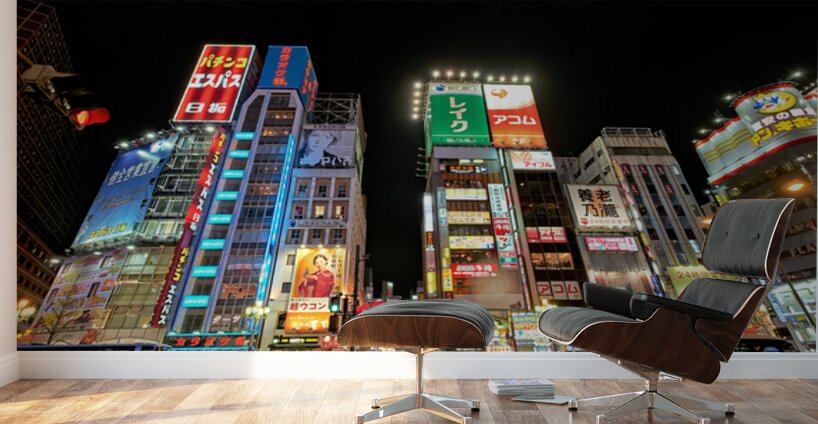 Neon lights shine bright in Shinjuku district of Tokyo at night Wall Murals