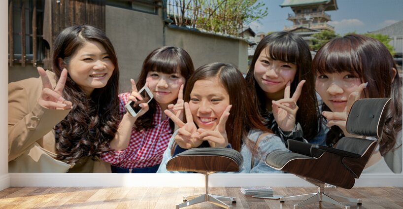 Young girls smiling in Kyoto while enjoying the day together Wall Murals
