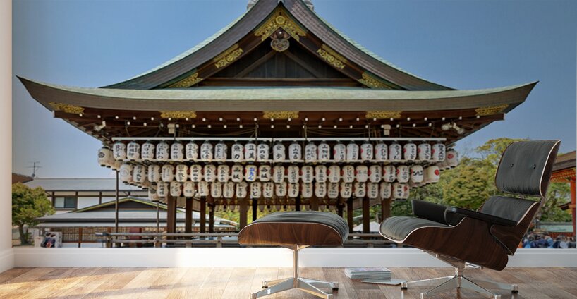Visitors admire Yasaka shrine in Kyoto during sunny day Wall Murals