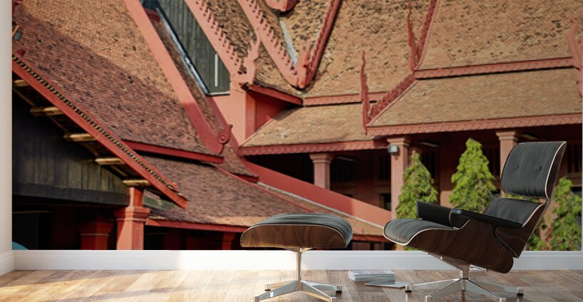 Monk walks through traditional Cambodian temple garden. Wall Murals