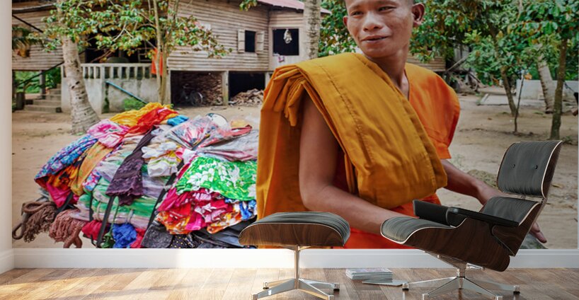 Monk with colorful textiles on a motorcycle. Wall Murals