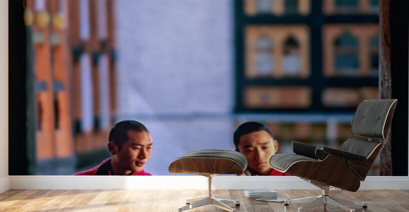 Bhutanese monks using a mobile phone. Wall Murals