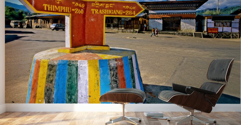 Colorful Bhutanese signpost directs to Thimphu and Trashigang. Wall Murals