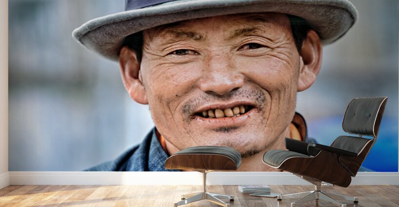 Portrait of a smiling man wearing a hat. Wall Murals