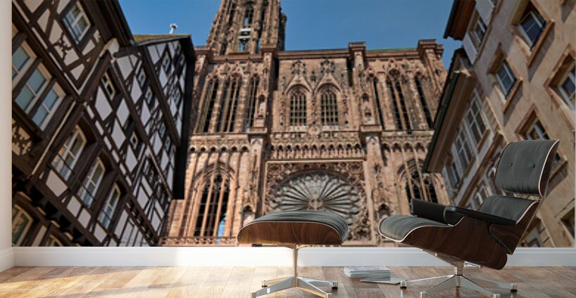 Tourists gather at Strasbourg Cathedral in Alsace on a sunny day Wall Murals
