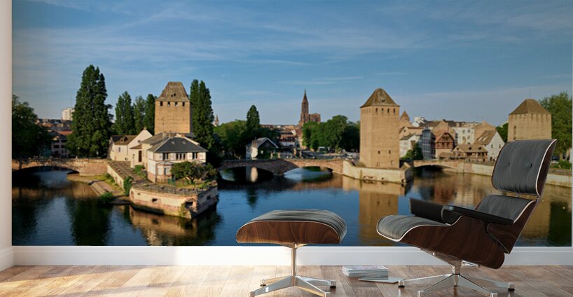 Covered bridges in Strasbourg by the river on a clear day Wall Murals