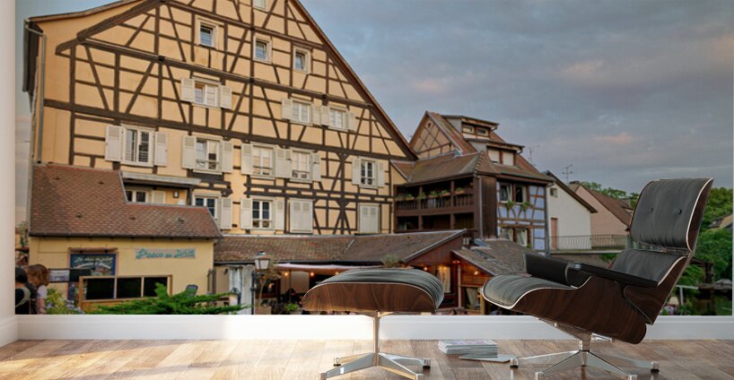 Dining by the canal in Colmar with timber framed houses in view Wall Murals