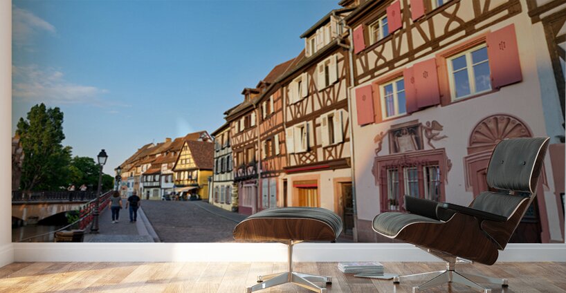 People walking along the canal in Petite Venise Colmar during ev Wall Murals
