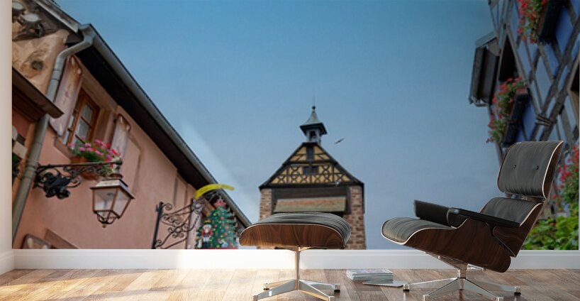 Tourists stroll through historic streets in Riquewihr Alsace Wall Murals