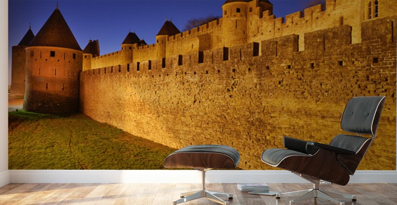 Exploring the ancient walls of Carcassonne in France at twilight Wall Murals